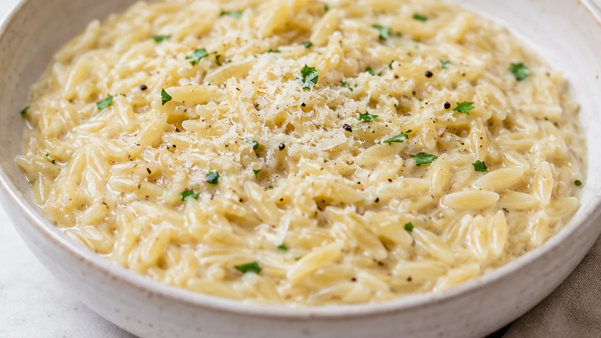 Dreamy Creamy Parmesan Garlic Orzo - creamy orzo - Creamy orzo: master this quick and delightful garlic parmesan side dish. Perfect with a hint of lemon, it's a